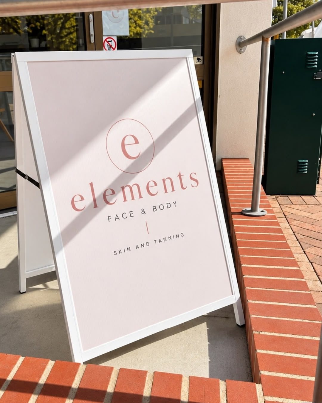 The Elements Face and Body sign outside the salon entrance on Crawford Street